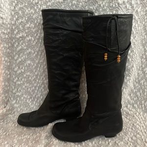 Born black leather boot, size 7.